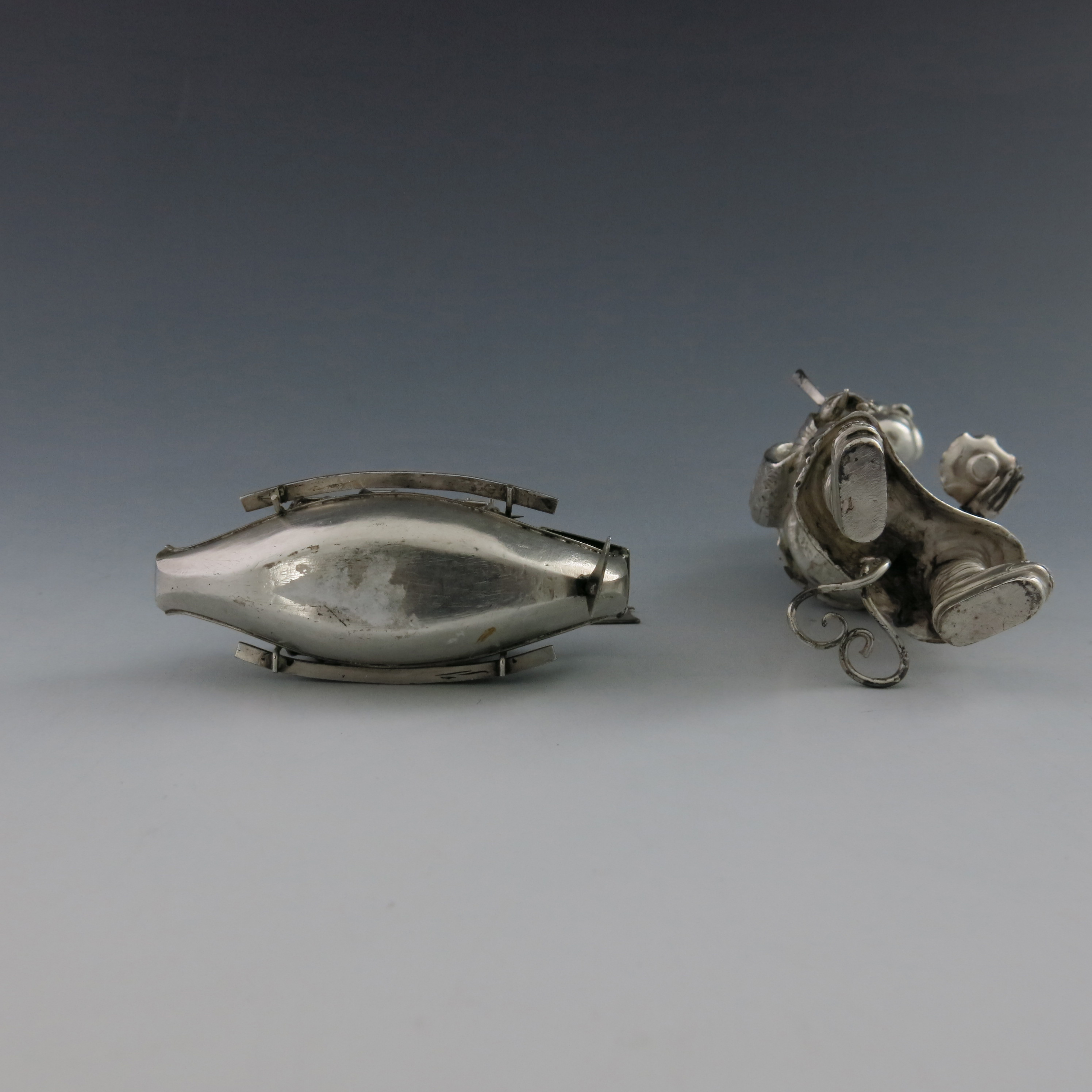 A novelty Chinese white metal condiment, early 20th Century, in the form of a seated Mandarin, - Image 5 of 5