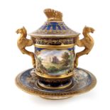 A Spode scene painted covered cabinet cup and stand