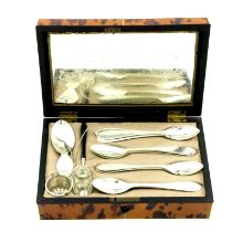 An early 19th century tortoiseshell cased Dutch silver tea accoutrement set