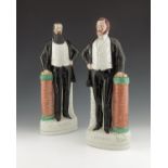 A pair of Staffordshire pottery figures, circa 1880, modelled as the evangelical preachers Moody and