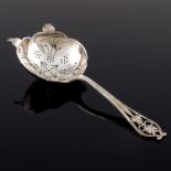 A George VI silver tea strainer, Viners, Sheffield 1951