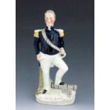 A Staffordshire figure of 'Sir Charles Napier', circa 1850, modelled standing, holding a telescope i