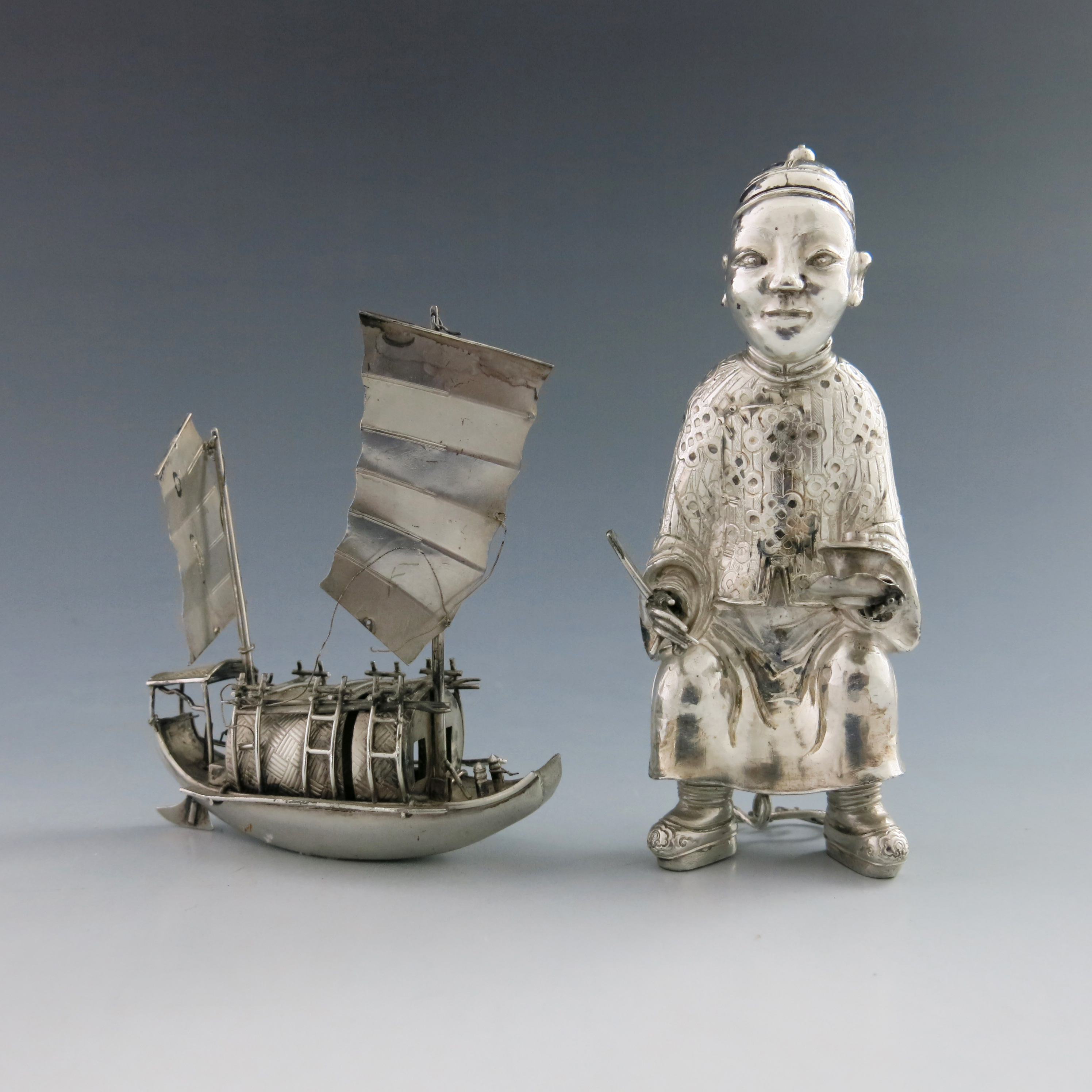 A novelty Chinese white metal condiment, early 20th Century, in the form of a seated Mandarin, - Image 3 of 5