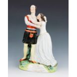 A Staffordshire figure group of Charlotte and Susan Cushman as Romeo and Juliet, circa 1850, the cou