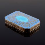 An Austrian silver gilt and champleve enamelled snuff box, Vienna circa 1900