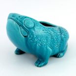 A Minton majolica jardiniere, turquoise glazed and modelled as a grotesque toad like mammal,