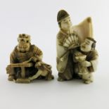 λ Two Japanese ivory netsukes, Meiji period, 1868-1912, one carved as a robed man with fan and