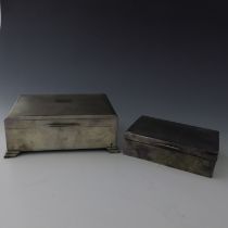 An Elizabeth II silver table cigarette casket, machine engraved cover, stepped bracket feet, maker