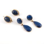 A pair of gold metal and lapis lazuli teardrop pendant earrings