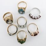 A collection of gem set 9ct yellow gold and gold metal dress rings (7)