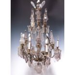 A large Bohemian brass and cut glass chandelier