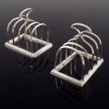A pair of George V silver four division toast racks, Hukin and Heath, Birmingham 1913