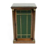 A Regency rosewood pier cabinet, circa 1820, of Empire design, green veined marble top, egg and dart