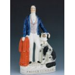 A Staffordshire figure of King Edward VII as the ‘Prince of Wales’, circa 1862, modelled standing wi