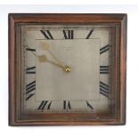 An early 20th Century desk easel timepiece, mahogany square cushion frame, silvered dial with