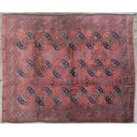 An antique Ersari Turkmen main carpet, with large tribal guls, 19th Century, 320 by 270cm