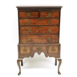 A George III country oak and mahogany crossbanded tallboy, circa 1780, plain moulded cornice, two