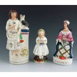 A Staffordshire figure titled 'Queen', circa 1860, modelled seated, together with a figure of a youn