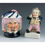 A Staffordshire pottery character pot, circa 1860, modelled as a man's head, double sided, his hat f