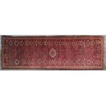 An antique Ersari Beshir main carpet of traditional design, 19th Century, 415 by 160cm