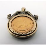 A 9ct yellow gold 1/10 Krugerrand coin pendant, 1984