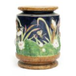 A George Jones majolica garden seat, late 19th Century, of cylindrical form with moulded with