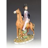 A Staffordshire figure of Robert Peel, titled 'Sir R. Peel', circa 1850, modelled on horseback, atop