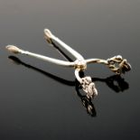 Johan Rohde for Georg Jensen, a pair of sterling silver sugar tongs, pierced and stylised acorn