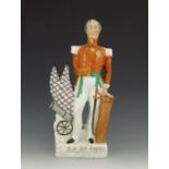 A Staffordshire Crimean War figure of Field-Marshall Lord Raglan, circa 1854, modelled standing besi