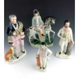 A collection of 19th Century Staffordshire figures, to include 'Havelock', modelled standing at a co