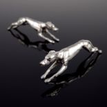 Sporting interest, a pair of early 20th Century white metal novelty knife rests, in the form of