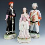 Three Staffordshire Shakespearian figures, 'Shylock' and 'Falstaff', circa 1860, both modelled stand