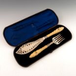 A pair of Victorian silver and ivory handled fish servers, Atkin Brothers, Sheffield 1860