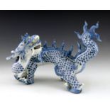 A Japanese Hirado porcelain figure of a dragon, Meiji period, 1868-1912, blue scales, four claws,
