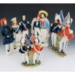 A Staffordshire Crimean War alliance figure group, circa 1856, modelled as Queen Victoria flanked by