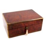 A mid 19th Century French amboyna dressing case by Louis Aucoc Aine, Paris, circa 1850, brass