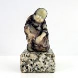 A Chinese carved hardstone figure