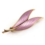 N M Thune, a Norwegian silver gilt and enamelled double leaf brooch