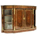 A mid Victorian burr walnut credenza, circa 1870, of breakfront form with gilt metal fittings,