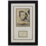 Judy Garland (American, 1922-1969), autograph with a sepia photograph above, 35 by 19cm, framed as