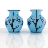 A pair of Secessionist enameled glass vases, circa 1920, shouldered form, blue opaque painted with
