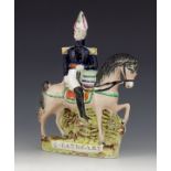 A Staffordshire figure of Major-General Sir George Cathcart, circa 1855, modelled riding a horse, on