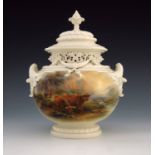John Stinton for Royal Worcester, a twin handled vase and cover, reticulated rim, the frieze painted
