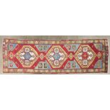 A Turkish Karapinar long rug, of traditional village design, 370 by 121cm