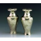 A pair of Japanese silver vases, Meiji, inverse baluster form, each engraved with prunus branches
