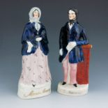 A pair of Staffordshire figures, 'F.G. Manning' and 'Maria Manning', circa 1850, both modelled stand