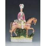 A pair of Staffordshire equestrian figures, titled 'Prince of Wales' and 'Princess', 19th Century, m