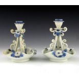 A pair of Japanese Hirado porcelain candlesticks, Meiji period, 1868-1912, in the form of