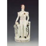 A Staffordshire figure of 'Leopold King of Belgium', circa 1840, modelled standing with his right ha