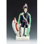 A Staffordshire Crimean War figure of General Windham, circa 1855, modelled standing beside a wall w